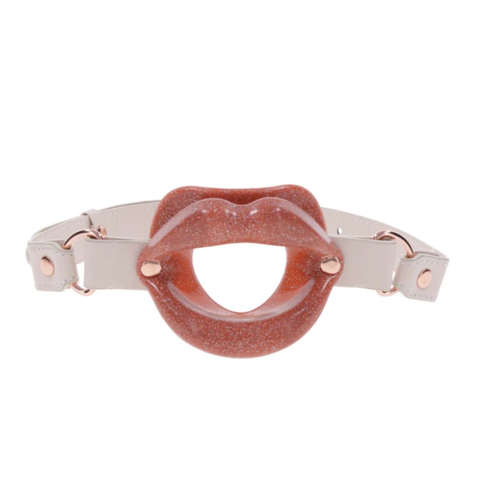 Peaches ‘n Creame silicone lip gag by Sex & Mischief, glitter finish, white adjustable strap